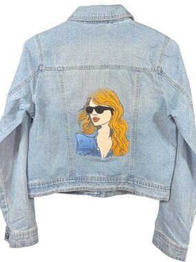 Denim jacket, rhinestone-studded front, and Taylor Swift custom-embroidered on b